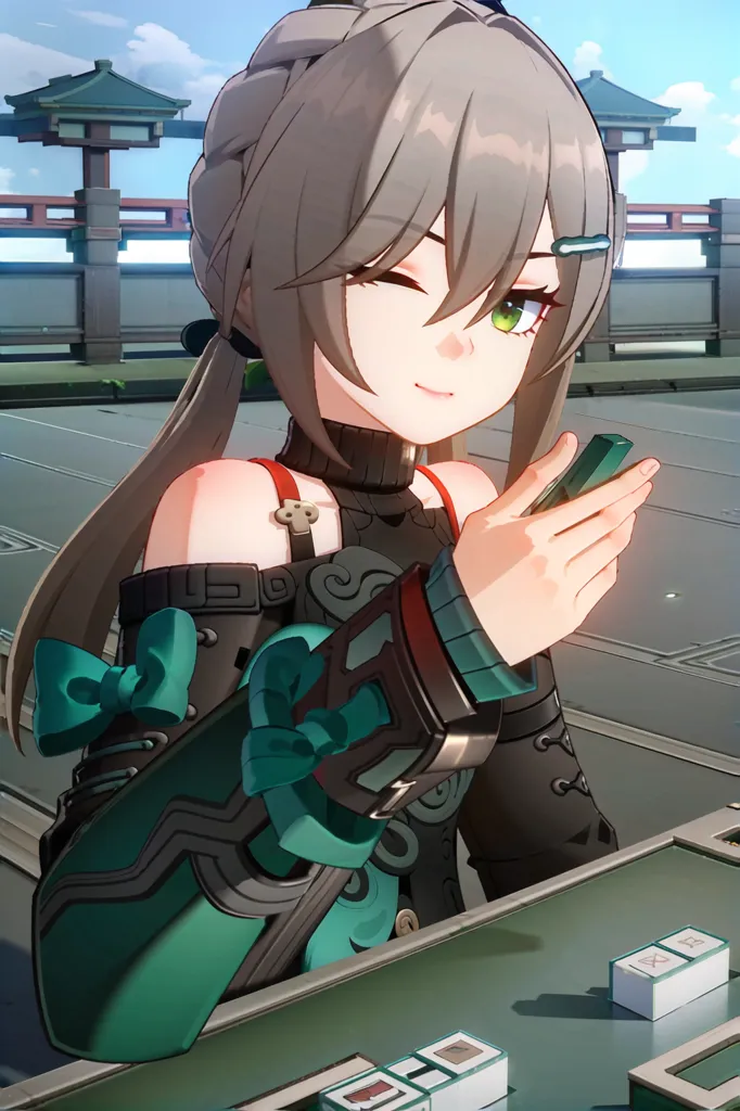 The image shows an anime girl with gray hair and green eyes. She is wearing a black and green outfit with a white collar. There is a green and blue bow on her right arm. She has a smug expression on her face and is winking her right eye. She is sitting at a table playing Mahjong. There are Mahjong tiles on the table. There is a building in the background.