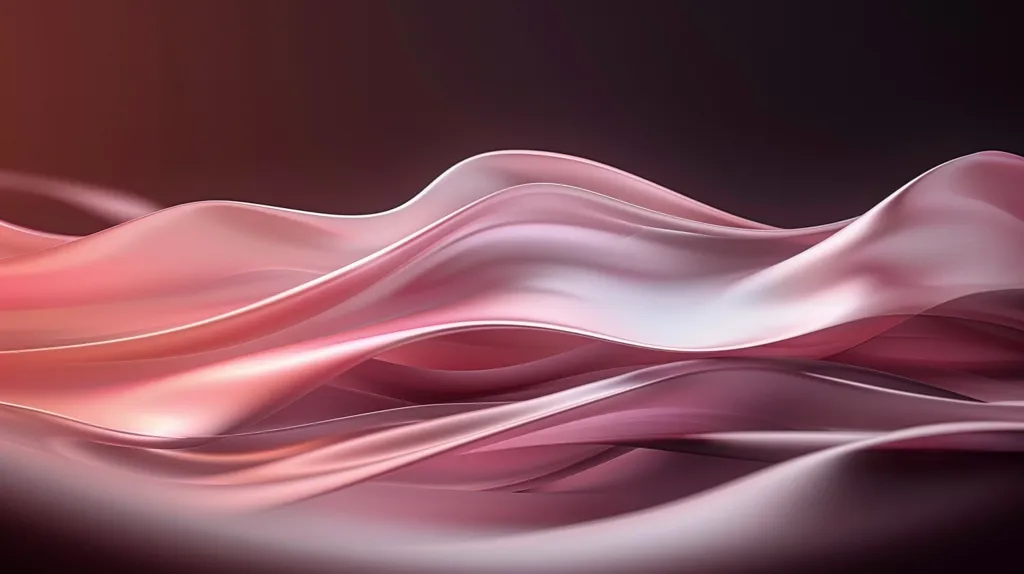 The image is of a pink silk cloth. The cloth is arranged in waves, with the folds running horizontally across the image. The cloth is lit from above, which creates a sense of depth and dimension. The image is very soft and feminine, and it has a calming and soothing effect.