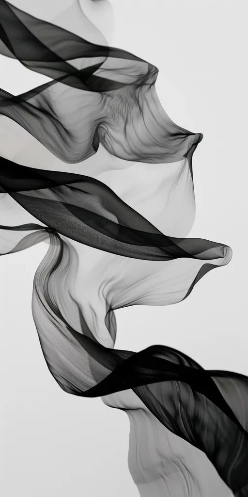 The image is a close-up of a black sheer fabric flowing in the air. The fabric is translucent and creates a soft, ethereal effect. The background is a simple white, highlighting the delicate nature of the fabric. The image creates a sense of movement and fluidity.  The interplay of light and shadow adds depth and dimension to the image.