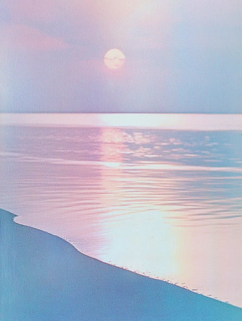 A soft, pastel sunset paints the sky with hues of pink and blue. The sun, a pale orb, hangs low in the horizon, casting a shimmering reflection on the calm, rippling water. A sandy beach stretches out, a gentle curve meeting the tranquil sea. The scene evokes a sense of peaceful tranquility and a serene, dreamlike atmosphere.