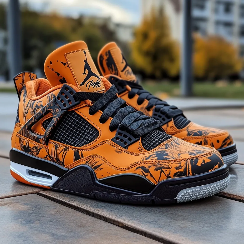Here's a description of the image:

Close-up view of a pair of custom Air Jordan 4 sneakers. The shoes are predominantly orange with a black and white graphic print that appears to be an artistic rendering. The black laces and midsole contrast with the vibrant orange upper. The Air Jordan logo is visible on the tongue. The shoes are resting on a wooden surface outdoors, with a blurred background suggesting an urban setting. The overall impression is one of high-quality, customized footwear with a striking design.
