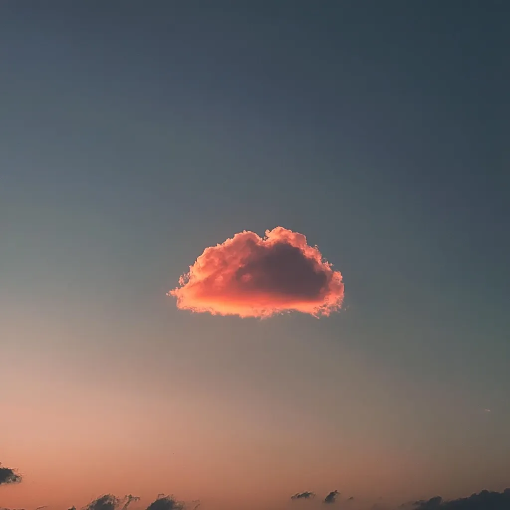 A single, peach-colored cloud floats in a vast, dusky sky.  The soft, warm hues of the sunset paint the lower portion of the sky, creating a serene and minimalist scene. The cloud is centrally positioned, drawing the eye to its unique color against the darkening blue.  The overall impression is one of calm and peaceful solitude.