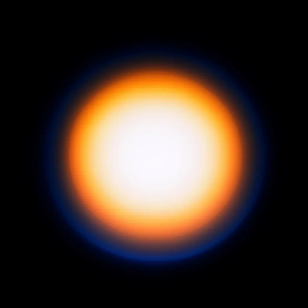 The image shows a bright, glowing orb against a completely black background.  The orb is predominantly white in the center, gradually transitioning to a warm orange and then a dark blue at its edges. The transition is smooth and creates a soft, blurry halo effect. The overall impression is one of warmth and ethereal luminosity.
