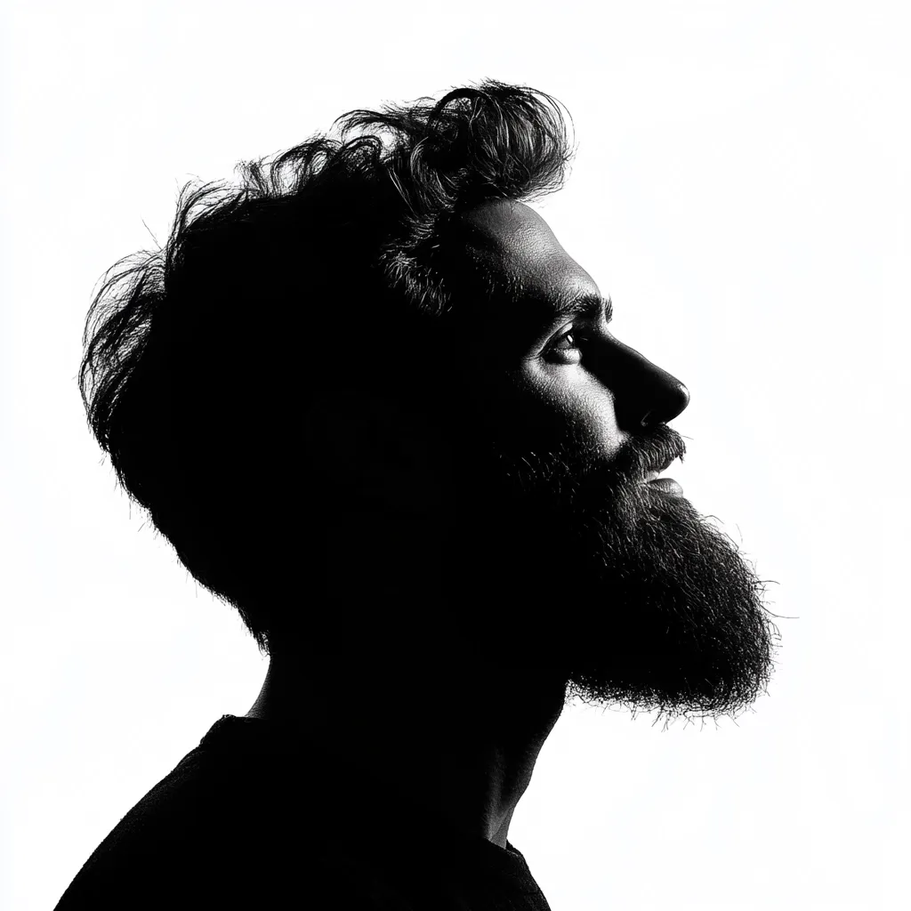 A black and white silhouette of a man's profile.  He has short, textured hair and a full beard. His head is tilted upward, suggesting contemplation or hope.  The image is stark and dramatic, emphasizing the shape of his face and features against a bright background.  The overall mood is reflective and serene.