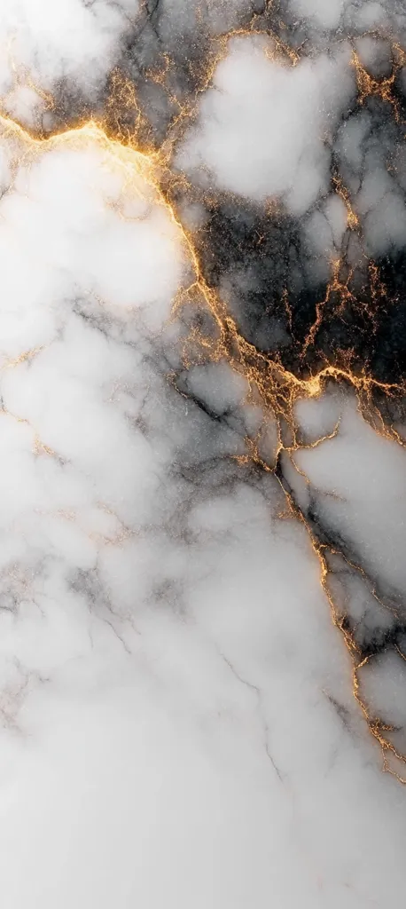 The image showcases a stunning marble texture, predominantly white with dark grey veining.  Intricate gold lines accentuate the natural pattern, creating a luxurious and elegant aesthetic. The contrast between the light and dark tones, combined with the shimmering gold, evokes a sense of depth and sophistication. The overall effect is a captivating display of natural beauty.