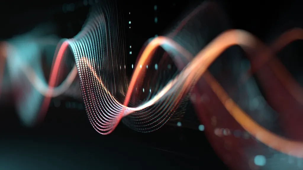 The image displays an abstract visualization of data, resembling flowing, luminous waves.  Intertwined strands of teal and orange light create a dynamic, almost three-dimensional effect against a dark background.  The lines are composed of numerous small points of light, suggesting a complex data stream or network.  The overall impression is one of movement, energy, and intricate connections.