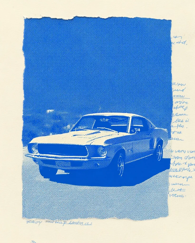 A vibrant blue monoprint depicts a classic Ford Mustang fastback. The car is rendered in white against a textured blue background, which appears to be fabric.  The image is bordered by irregular edges, giving a handmade, collaged feel.  Handwritten notes in blue ink are visible on the right side of the artwork. The overall impression is one of vintage cool and artistic expression.