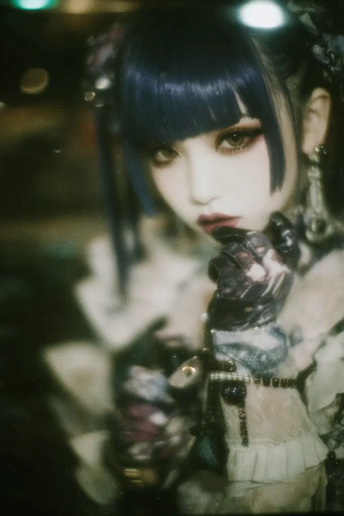 A close-up, darkly lit portrait of a young woman with dark blue, blunt-cut bangs.  She's wearing intricate, possibly gothic-inspired attire, including ornate gloves and a lace-trimmed garment.  The image has a dreamy, slightly out-of-focus quality, enhancing its mysterious atmosphere.  Her expression is pensive and alluring. The overall aesthetic is dark, romantic, and slightly mysterious.