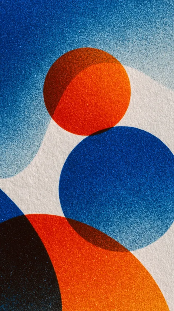 An abstract image featuring overlapping circles in shades of blue and orange. The circles are textured, giving a grainy appearance. The colors are vibrant and contrasted against a white background. The design is reminiscent of mid-century modern art or a screen print.  The overlapping creates depth and visual interest.