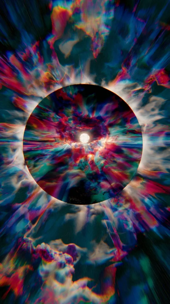 A vibrant, abstract image features a central, dark circle surrounded by a swirling vortex of iridescent colors.  The hues range from deep blues and purples to vibrant pinks and reds, creating a sense of movement and energy.  A bright, almost white light emanates from the center, adding a mystical quality to the piece. The overall effect is psychedelic and visually striking.