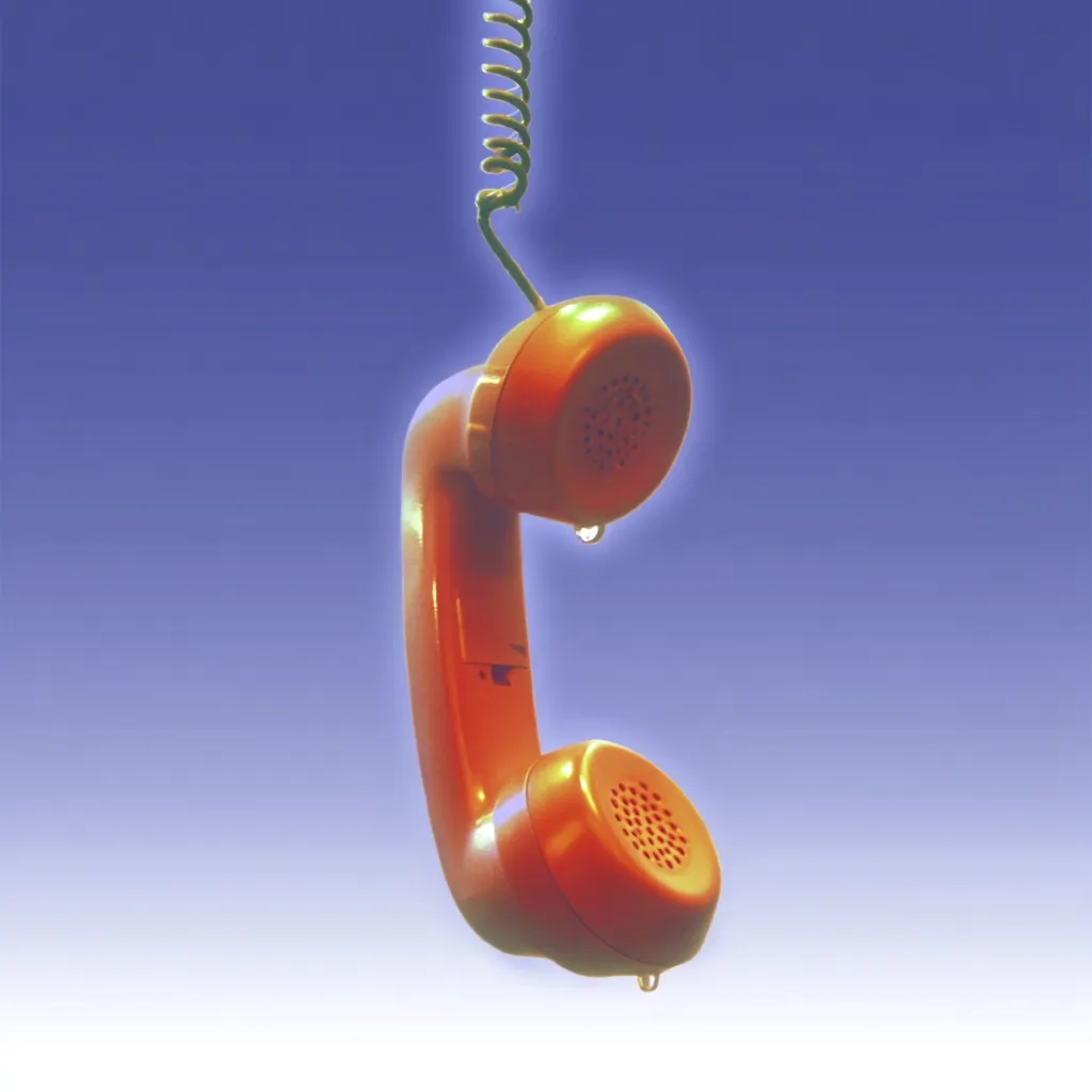 A vintage orange telephone handset hangs upside down, dripping water.  The coiled cord extends upwards.  The image is set against a gradient blue background, suggesting a concept of communication breakdown, disconnection, or perhaps a malfunction due to water damage.  The overall mood is melancholic.