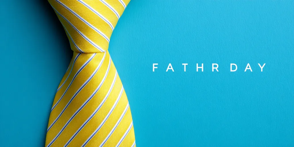 A yellow and white striped necktie is positioned against a vibrant teal background.  The words "FATHER DAY" are displayed in a simple sans-serif font, centrally aligned. The image evokes a sense of Father's Day, celebrating paternal figures. The contrast between the tie and background creates a clean and festive design.