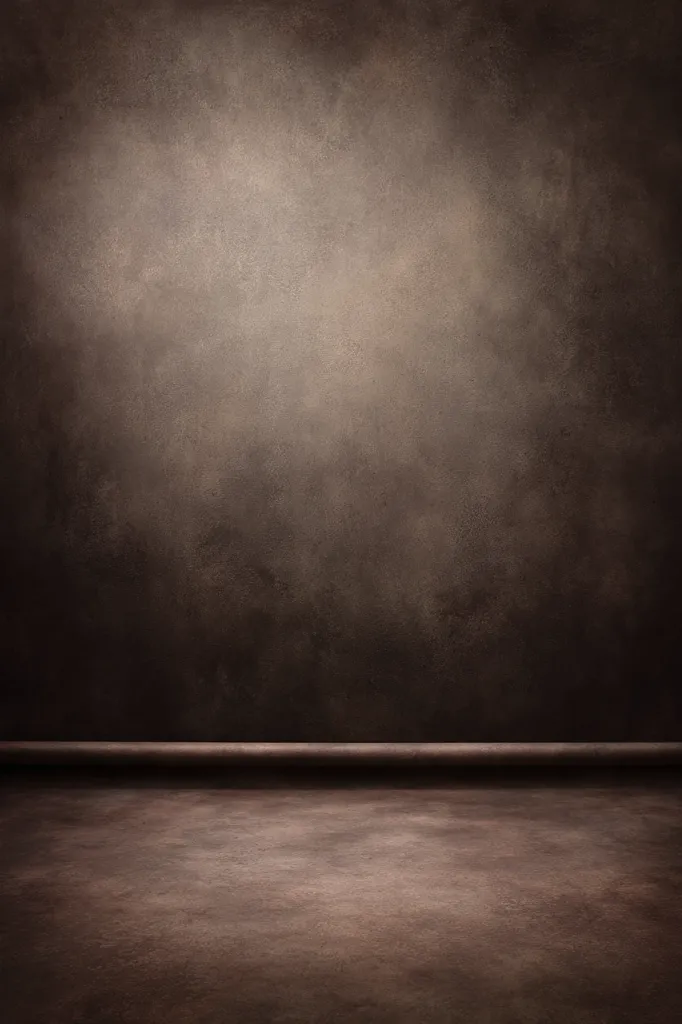 The image shows a dark brown room with a textured wall and floor. The wall is a mottled brown, darker at the bottom, creating a vignette effect.  A subtle horizontal line separates the wall from the floor, which is a matching dark brown with a slightly smoother texture. The overall mood is somber and moody, suitable as a neutral backdrop.