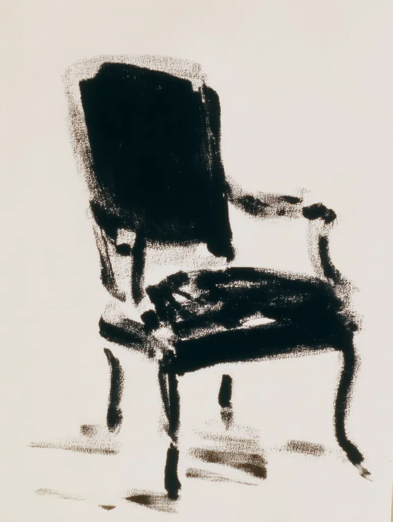 An abstract expressionist charcoal drawing depicts a chair.  The chair is rendered in bold, dark strokes, suggesting form rather than precise detail.  The background is a light, off-white, providing stark contrast to the black chair. The style is loose and gestural, focusing on the energy and essence of the subject.  The overall impression is one of simplicity and power.