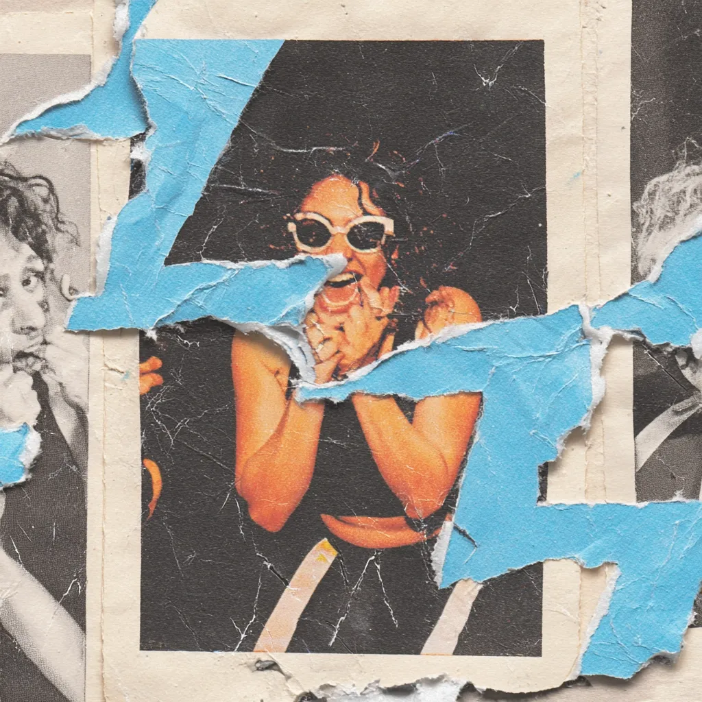 A torn poster features a close-up image of a woman with dark curly hair, wearing white sunglasses and a dark top. Her mouth is open in a joyful expression, and her hands are raised to her face.  The poster is significantly damaged, with large pieces of light blue paper overlaying and obscuring parts of the image.  The edges are frayed and worn, giving it a vintage, distressed aesthetic.  Fragments of other black and white images are visible around the edges.