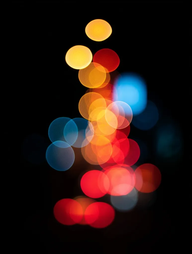 A mesmerizing display of out-of-focus lights dominates the image, set against a stark black background.  The bokeh effect creates a cascade of vibrant circles in hues of red, orange, yellow, and blue.  The colors blend and overlap, forming a visually striking and abstract composition. The overall effect is one of warmth and energy, suggesting a nighttime scene filled with bright illumination.